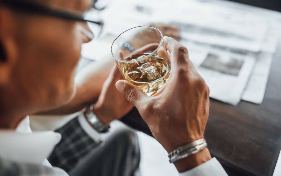 A man about to drink alcohol; could he be at risk for liver disease?