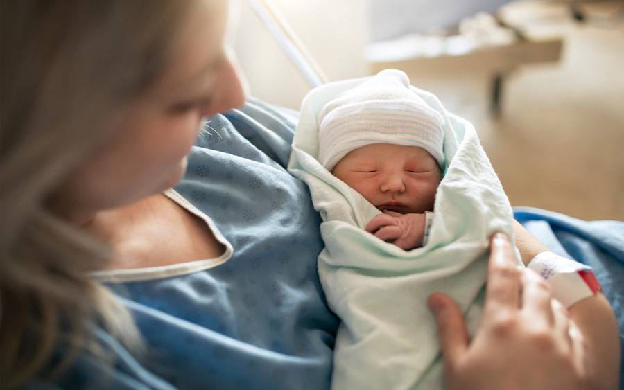 Mom and baby after delivery; cord blood banking an option.