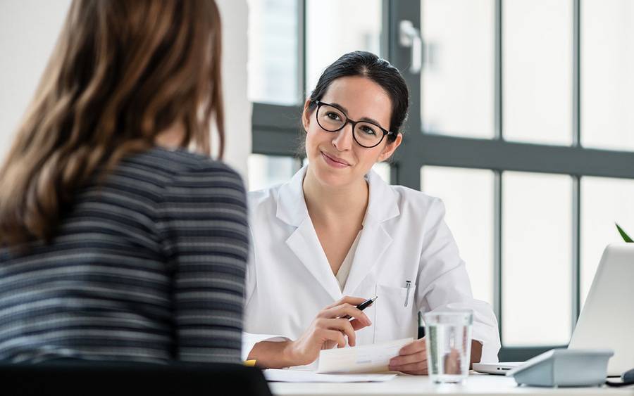 A primary care physician coordinates care for an HMO patient.