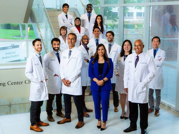 Members of the Scripps Cardiovascular Disease Fellowship Program gather for a photo at the Scripps Clinic John R. Anderson V Medical Pavilion in La Jolla.