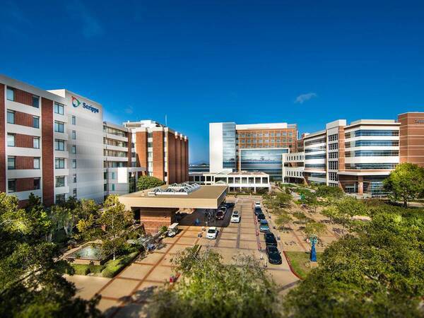 Scripps La Jolla campus showing the front of the main hospital and Scripps Clinic